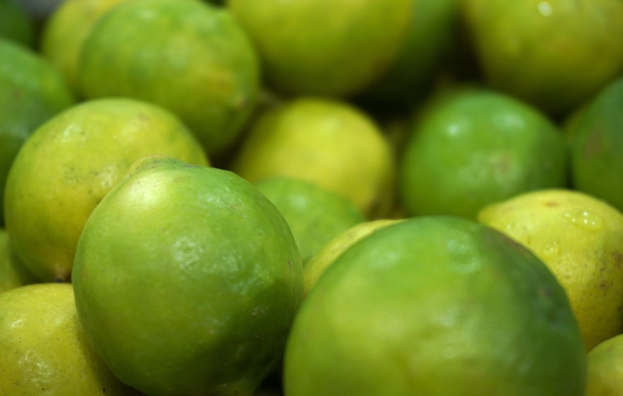 about-03 Vibrant green limes closely photographed, showcasing freshness and natural appeal.
